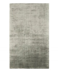Presenting a solid, steel hue in soft viscose, the Beckett area rug from Lauren Ralph Lauren offers a chic ground ripe for enhancing any modern setting. Durable enough to withstand heavy indoor traffic, yet luxuriously soft underfoot. Presenting a solid, steel hue in soft viscose, the Beckett area rug from Lauren Ralph Lauren offers a chic ground ripe for enhancing any modern setting. Durable enough to withstand heavy indoor traffic, yet luxuriously soft underfoot.
