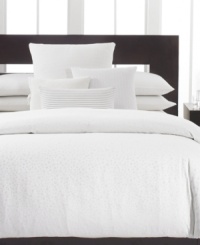 Sleep in luxury. Complement the Mykonos bedding collection from Calvin Klein with this fitted sheet, featuring soft 300-thread count combed cotton percale in a dreamy cream hue. Sleep in luxury. Complement the Mykonos bedding collection from Calvin Klein with this fitted sheet, featuring soft 300-thread count combed cotton percale in a dreamy cream hue.