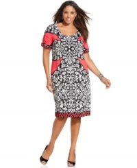 Impress from day to play with INC's short sleeve plus size dress, featuring a mesmerizing print. Impress from day to play with INC's short sleeve plus size dress, featuring a mesmerizing print.