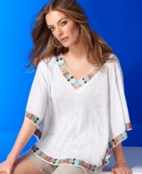 Work the season's tribal print trend into your wardrobe effortlessly with INC's linen poncho. The sequined and embellished trim adds a touch of color, too. Work the season's tribal print trend into your wardrobe effortlessly with INC's linen poncho. The sequined and embellished trim adds a touch of color, too.