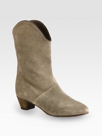 Rich leather trim finishes this western-inspired shape of fine suede. Stacked heel, 1¾ (45mm)Shaft, 9¾Leg circumference, 12Suede upper with leather trimLeather liningLeather and rubber solePadded insoleImportedOUR FIT MODEL RECOMMENDS ordering one half size up as this style runs small. 