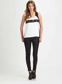 A brilliant combination of mixed media and on-trend colorblocking, this sleeveless crepe top features a luxe-leather detail.U-neckSleevelessLeather stripeButton closure at keyhole backAbout 25 from shoulder to hemPolyesterDry cleanMade in USA of imported fabric Model shown is 5'10 (177cm) wearing US size Small. A brilliant combination of mixed media and on-trend colorblocking, this sleeveless crepe top features a luxe-leather detail.U-neckSleevelessLeather stripeButton closure at keyhole backAbout 25 from shoulder to hemPolyesterDry cleanMade in USA of imported fabric Model shown is 5'10 (177cm) wearing US size Small.