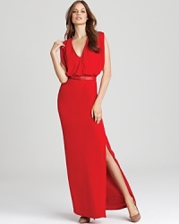 Make brilliant color your trademark in this RAOUL gown. A fiery hue ignites an ethereal silhouette, while a daring side slit finishes the style with a blaze of feminine glamour. Make brilliant color your trademark in this RAOUL gown. A fiery hue ignites an ethereal silhouette, while a daring side slit finishes the style with a blaze of feminine glamour.