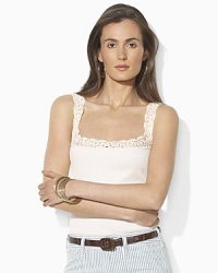 Delicate crochet detailing at the neckline and straps lends a charming vintage aesthetic to a soft ribbed-knit cotton tank. Delicate crochet detailing at the neckline and straps lends a charming vintage aesthetic to a soft ribbed-knit cotton tank.