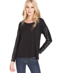 Faux-leather trim ups the edge on this Kensie top, perfect for an urban-chic look! Faux-leather trim ups the edge on this Kensie top, perfect for an urban-chic look!