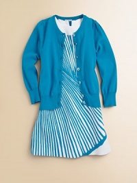 A classic long-sleeved cardigan is rendered in a soft knit and adorned with clear buttons and Pointelle trim for a timeless look.CrewneckLong sleevesButton frontPointelle detail at collar, buttons, cuffs and hem70% viscose/30% polyesterDry cleanImported Please note: Number of buttons may vary depending on size ordered. A classic long-sleeved cardigan is rendered in a soft knit and adorned with clear buttons and Pointelle trim for a timeless look.CrewneckLong sleevesButton frontPointelle detail at collar, buttons, cuffs and hem70% viscose/30% polyesterDry cleanImported Please note: Number of buttons may vary depending on size ordered.