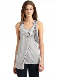 THE LOOKScoopneckFront broken bead embellishmentSemi-sheer ruffled detail at chestLayered drapingTHE FITAbout 31 from shoulder to hemTHE MATERIAL80% polyester/20% rayonCARE & ORIGINDry cleanImportedModel shown is 5'10 (177cm) wearing US size Small. THE LOOKScoopneckFront broken bead embellishmentSemi-sheer ruffled detail at chestLayered drapingTHE FITAbout 31 from shoulder to hemTHE MATERIAL80% polyester/20% rayonCARE & ORIGINDry cleanImportedModel shown is 5'10 (177cm) wearing US size Small.