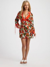 Featuring the signature Milly rose print, a breezy, chiffon-trimmed coverup. V-neckThree-quarter tie sleevesCottonFully linedDry cleanMade in USA of Italian fabricPlease note: Bikini bottom sold separately. Featuring the signature Milly rose print, a breezy, chiffon-trimmed coverup. V-neckThree-quarter tie sleevesCottonFully linedDry cleanMade in USA of Italian fabricPlease note: Bikini bottom sold separately.