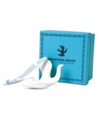 Take a minimalist approach to trimming the tree with Jonathan Adler's dove ornament, featuring matte white porcelain for a look of modern grace. Take a minimalist approach to trimming the tree with Jonathan Adler's dove ornament, featuring matte white porcelain for a look of modern grace.