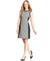 Evan Picone's petite dress features a bold take on a houndstooth print at the front and a classic A-line silhouette.