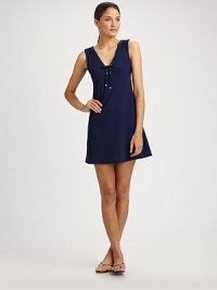 Navy stretch knit has a chic lace-up front for instant nautical flare.Wide straps V neckline Empire seam Pullover style About 15 from natural waist 72% nylon/28% Lycra Hand wash Made in USA of Italian fabric Navy stretch knit has a chic lace-up front for instant nautical flare.Wide straps V neckline Empire seam Pullover style About 15 from natural waist 72% nylon/28% Lycra Hand wash Made in USA of Italian fabric