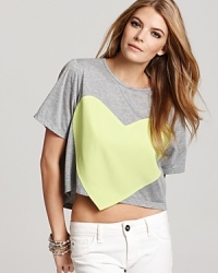 This Laugh Cry Repeat tee flaunts an electric-hued woven heart for a high-voltage pop of color. This Laugh Cry Repeat tee flaunts an electric-hued woven heart for a high-voltage pop of color.