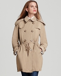 Boasting classic details, this Moncler anorak trench is a perennial wardrobe essential. Boasting classic details, this Moncler anorak trench is a perennial wardrobe essential.