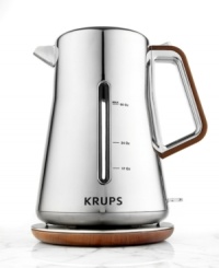 Spot on! Smart-looking, this sophisticated electric kettle brings style and top service into your space. The shimmering stainless steel, chrome and wood optics construction catches the eye and makes serving a spot of tea completely effortless with a 360º rotational base, cordless design and automatic opening. 1-year warranty. Spot on! Smart-looking, this sophisticated electric kettle brings style and top service into your space. The shimmering stainless steel, chrome and wood optics construction catches the eye and makes serving a spot of tea completely effortless with a 360º rotational base, cordless design and automatic opening. 1-year warranty.