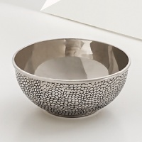 The grand form of a mythical dragon was the muse behind this sculptural nut bowl from Natori. It's artfully hand cast to capture a rich reptile-inspired texture. The grand form of a mythical dragon was the muse behind this sculptural nut bowl from Natori. It's artfully hand cast to capture a rich reptile-inspired texture.