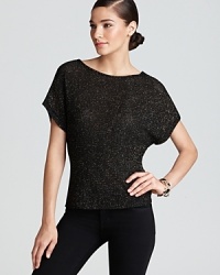 Our love affair with metallic makes a stylish segue from summer through fall with this subtly sparkly Generation Love top. Our love affair with metallic makes a stylish segue from summer through fall with this subtly sparkly Generation Love top.