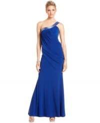 JS Collection's evening gown is made extra dazzling with a jeweled, one-shoulder silhouette and a sexy drape that sweeps the bodice to one side. JS Collection's evening gown is made extra dazzling with a jeweled, one-shoulder silhouette and a sexy drape that sweeps the bodice to one side.