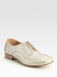 A metallic fishnet overlay adds textural appeal to this glittery lace-up essential. Glitter-coated upper with metallic stitched overlayLeather lining and solePadded insoleMade in Italy A metallic fishnet overlay adds textural appeal to this glittery lace-up essential. Glitter-coated upper with metallic stitched overlayLeather lining and solePadded insoleMade in Italy