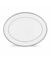 Designed to mimic a strand of lustrous pearls. With imitation pearl accents and platinum rims on fine bone china. Designed to mimic a strand of lustrous pearls. With imitation pearl accents and platinum rims on fine bone china.