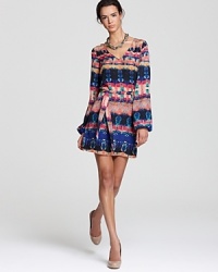 Exude bohemian cool in this boldly printed Aqua dress. A belt cinches the waist and billowing sleeves add to the hippie-chic charm. Exude bohemian cool in this boldly printed Aqua dress. A belt cinches the waist and billowing sleeves add to the hippie-chic charm.