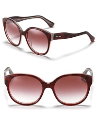 Make waves in these round oversized sunglasses with curvy temples. By Miu Miu. Make waves in these round oversized sunglasses with curvy temples. By Miu Miu.