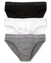 BOSS Black brings you a three-pack of essential cotton briefs, complete with a logo waistband. BOSS Black brings you a three-pack of essential cotton briefs, complete with a logo waistband.
