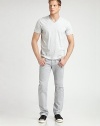 Subtle stripes and a timeless v-neck define this soft cotton basic. V-neckShort sleevesCottonMachine washImported