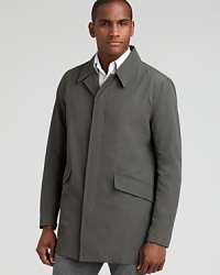 Stylish weather-wear from Theory, this clean, modern rain jacket has a concealed button front, flap collar and flap hand pockets. Stylish weather-wear from Theory, this clean, modern rain jacket has a concealed button front, flap collar and flap hand pockets.