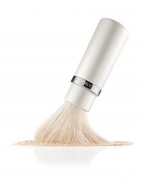 A first-of-its-kind, this sumptuous brush was designed for dual, loose and pressed powder application, providing the ultimate in custom coverage. At first extension, it picks up a generous amount of powder for richer coverage. At full extension, it dusts a fine amount of powder onto the skin, creating sheer coverage. The finest natural hairs glide luxuriously over the skin to create a smooth and even, naturally buffed appearance. Closed: 4¾ Fully extended: 5¼ A first-of-its-kind, this sumptuous brush was designed for dual, loose and pressed powder application, providing the ultimate in custom coverage. At first extension, it picks up a generous amount of powder for richer coverage. At full extension, it dusts a fine amount of powder onto the skin, creating sheer coverage. The finest natural hairs glide luxuriously over the skin to create a smooth and even, naturally buffed appearance. Closed: 4¾ Fully extended: 5¼