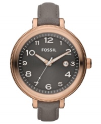 An extra large dial and slim leather strap complement the cool grays and warm roses on this Bridgette collection watch by Fossil. An extra large dial and slim leather strap complement the cool grays and warm roses on this Bridgette collection watch by Fossil.
