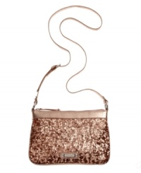 A laid-back silhouette gets a glam update in shimmery sequin that's absolutely eye-catching. With plenty of interior pockets, convenient crossbody strap and secure top zip closure, this Nine West design is the perfect marriage of fabulous and function.