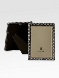 A richly detailed, oxidized platinum frame is hand-embellished with faceted Swarovski crystals. From the Noir Collection Hand wipe ImportedDIMENSION INFORMATION4 X 6 (5 X 7 overall)5 X 7 (6 X 8 overall)8 X 10 (9 X 11 overall) A richly detailed, oxidized platinum frame is hand-embellished with faceted Swarovski crystals. From the Noir Collection Hand wipe ImportedDIMENSION INFORMATION4 X 6 (5 X 7 overall)5 X 7 (6 X 8 overall)8 X 10 (9 X 11 overall)