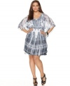 Spark up your look this spring with Style&co.'s butterfly sleeve plus size dress, accentuated by a smocked empire waist.