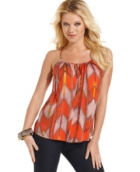 A powerful print adds global spirit to this relaxed fit top from GUESS?. Pair the piece with skinny jeans for a casual day look that packs color power. A powerful print adds global spirit to this relaxed fit top from GUESS?. Pair the piece with skinny jeans for a casual day look that packs color power.