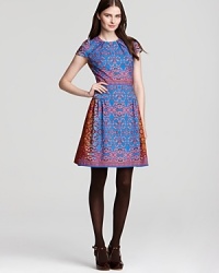 Beautiful colors intermingled with a whimsical design print that enliven this pretty, pleated Nanette Lepore dress.We give this A-line silhouette an A+. Beautiful colors intermingled with a whimsical design print that enliven this pretty, pleated Nanette Lepore dress.We give this A-line silhouette an A+.