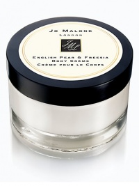 Experience the surprising, sensuous freshness of sweet pears, wrapped in a bouquet of white freesias, on a subtle background of scrambling wild roses an skin-warming amber, pathouli and woods. English Pear & Freesia Body Créme, an exquisite combination of texture and scent, is the utmost indulgence. It keeps skin soft and pampered every day. 5.9 oz. Experience the surprising, sensuous freshness of sweet pears, wrapped in a bouquet of white freesias, on a subtle background of scrambling wild roses an skin-warming amber, pathouli and woods. English Pear & Freesia Body Créme, an exquisite combination of texture and scent, is the utmost indulgence. It keeps skin soft and pampered every day. 5.9 oz.