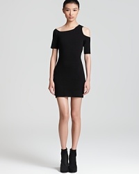 Look haute in this Helmut Lang cold-shoulder dress, cut in an abbreviated silhouette for true drama. Look haute in this Helmut Lang cold-shoulder dress, cut in an abbreviated silhouette for true drama.
