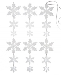 Triple the trim. Three glittering snowflakes compose each ornament in this Holiday Lane set, recreating the splendor of winter's first snowfall. Triple the trim. Three glittering snowflakes compose each ornament in this Holiday Lane set, recreating the splendor of winter's first snowfall.