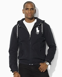 A sturdy yet lightweight twill windbreaker is adorned with various functional details and signature embroidery to protect you from the elements in style. A sturdy yet lightweight twill windbreaker is adorned with various functional details and signature embroidery to protect you from the elements in style.
