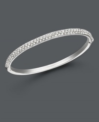 Add a hint of sparkle for an ultra-glam look. Eliot Danori's bangle bracelet features rows of sparkling crystal set in silver tone mixed metal. Approximate diameter: 2-1/4 inches. Add a hint of sparkle for an ultra-glam look. Eliot Danori's bangle bracelet features rows of sparkling crystal set in silver tone mixed metal. Approximate diameter: 2-1/4 inches.