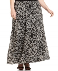Take your career style to new lengths with DKNYC's printed plus size maxi skirt, defined by a flattering A-line shape. Take your career style to new lengths with DKNYC's printed plus size maxi skirt, defined by a flattering A-line shape.