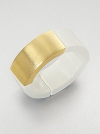 Glossy resin and 22k goldplating in a modern and chic stretch design. Resin22k goldplatingDiameter, about 2.5Slip-on styleMade in USA Glossy resin and 22k goldplating in a modern and chic stretch design. Resin22k goldplatingDiameter, about 2.5Slip-on styleMade in USA
