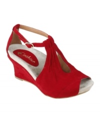 Indulge in decadent style. With draped suede, a dainty ankle strap and a plush footbed, the Veria Too wedge sandals by Earthies are the perfect treat - both sassy and sensible. Indulge in decadent style. With draped suede, a dainty ankle strap and a plush footbed, the Veria Too wedge sandals by Earthies are the perfect treat - both sassy and sensible.