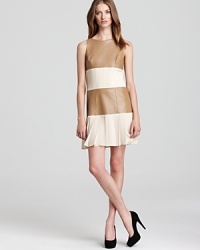 Color-blocking and luxurious textures meet in this Sachin + Babi dress. Chiffon pleating breaks up the leather panels for a truly unique (and chic) combo. Color-blocking and luxurious textures meet in this Sachin + Babi dress. Chiffon pleating breaks up the leather panels for a truly unique (and chic) combo.