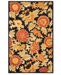 Attractive wildflowers create a sprawling, carefree design upon luxurious, long wool fibers. Woven meticulously in India, the Blossoms area rug from Safavieh presents these florals in bright hues with the modern home in mind. Attractive wildflowers create a sprawling, carefree design upon luxurious, long wool fibers. Woven meticulously in India, the Blossoms area rug from Safavieh presents these florals in bright hues with the modern home in mind.