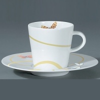 For over two centuries Raynaud has created unique Limoges porcelain, with a marked preference for relief shapes and generously colored and gilt decorations. Metamorphoses is a striking pattern of red and gold with a butterfly motif. For over two centuries Raynaud has created unique Limoges porcelain, with a marked preference for relief shapes and generously colored and gilt decorations. Metamorphoses is a striking pattern of red and gold with a butterfly motif.