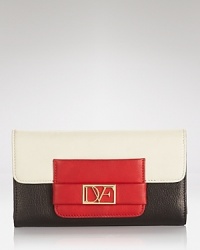Color blocked mod colors make a bold statement on a continental wallet from DIANE von FURSTENBERG. Color blocked mod colors make a bold statement on a continental wallet from DIANE von FURSTENBERG.
