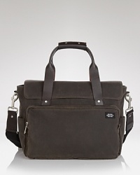 The military inspires this canvas briefcase from Jack Spade: functional, durable, handsome. The military inspires this canvas briefcase from Jack Spade: functional, durable, handsome.