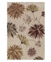 A burst of blooms flourishes on a muted palette - tan, cocoa, sunlit green, moss, sage, chocolate and taupe - making a bold, beautiful impression in any home. Rife with lush texture and detail, this luxurious area rug from Dalyn is hand tufted in polyester and acrylic, ensuring superior color retention and long-lasting wear. A burst of blooms flourishes on a muted palette - tan, cocoa, sunlit green, moss, sage, chocolate and taupe - making a bold, beautiful impression in any home. Rife with lush texture and detail, this luxurious area rug from Dalyn is hand tufted in polyester and acrylic, ensuring superior color retention and long-lasting wear.