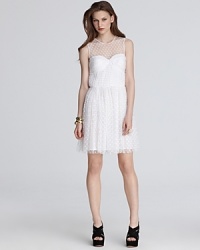 This Cynthia Steffe dress exemplifies the versatility of white, taking a feminine look and proving it edgy when it's paired with chunky black wedges for a modern interpretation the light-hued trend. Swiss dots add definition to the silhouette, which is as perfect for a party as it is for club-going. This Cynthia Steffe dress exemplifies the versatility of white, taking a feminine look and proving it edgy when it's paired with chunky black wedges for a modern interpretation the light-hued trend. Swiss dots add definition to the silhouette, which is as perfect for a party as it is for club-going.